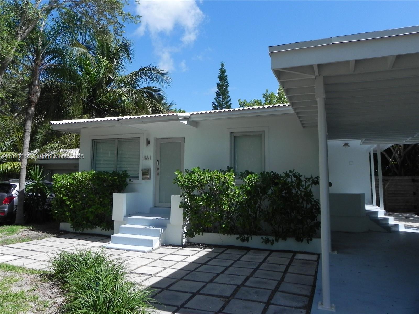 Bayside Miami, FL 33138 - Photo 3 of 44 front view of a house with a yard