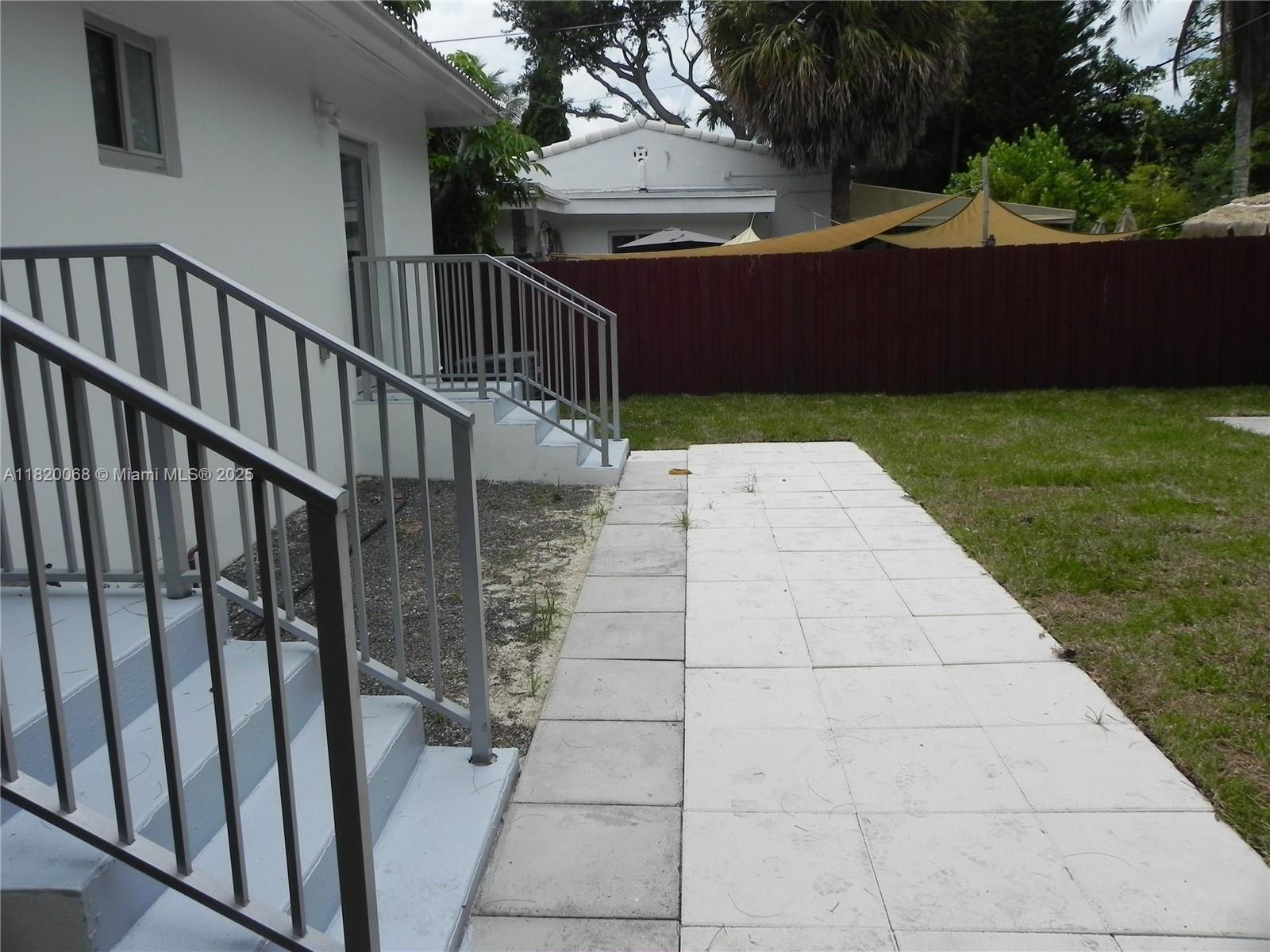 Bayside Miami, FL 33138 - Photo 33 of 44 a view of a porch with a yard