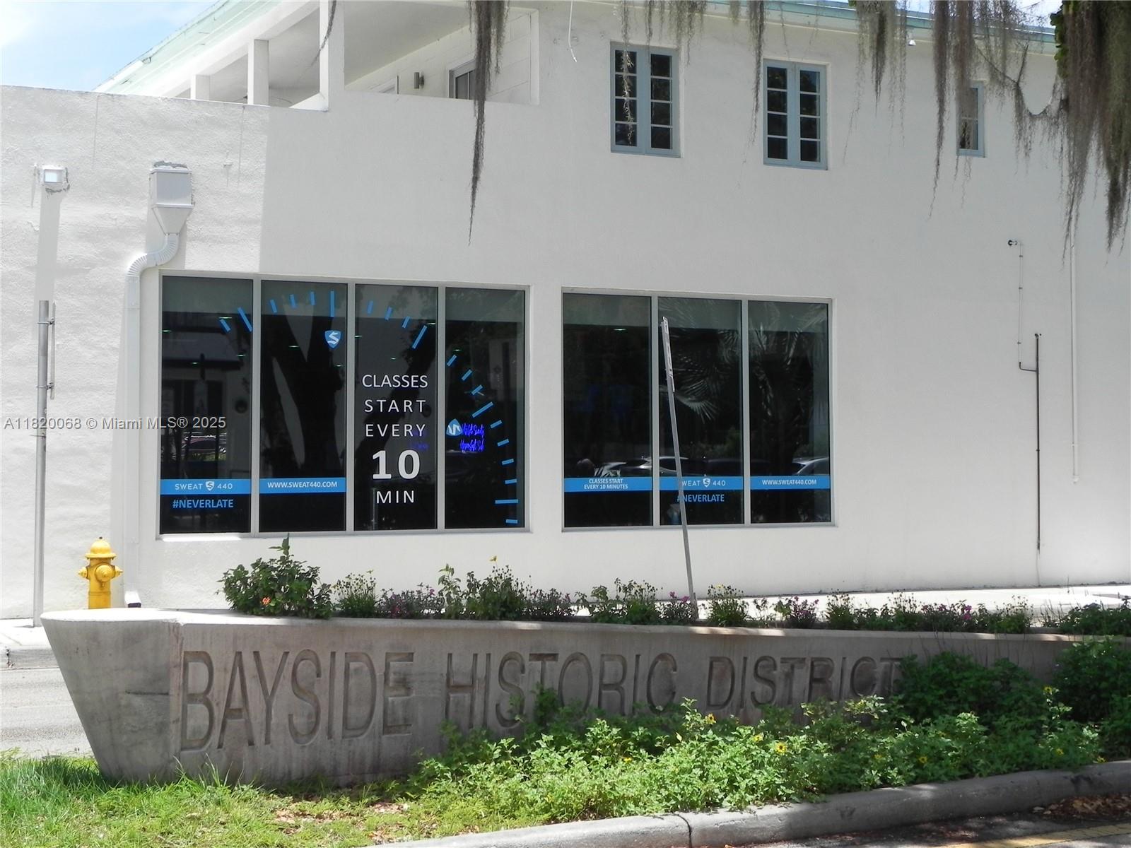 Bayside Miami, FL 33138 - Photo 36 of 44 front view of a house with a yard and potted plants
