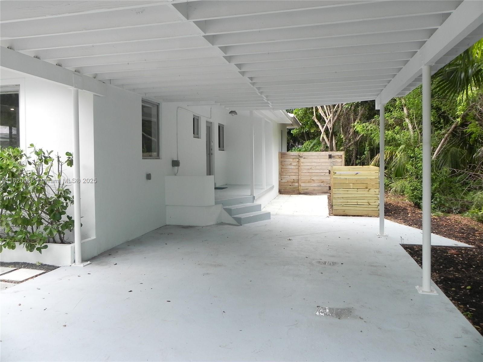 Bayside Miami, FL 33138 - Photo 5 of 44 a view of a porch with furniture and garden