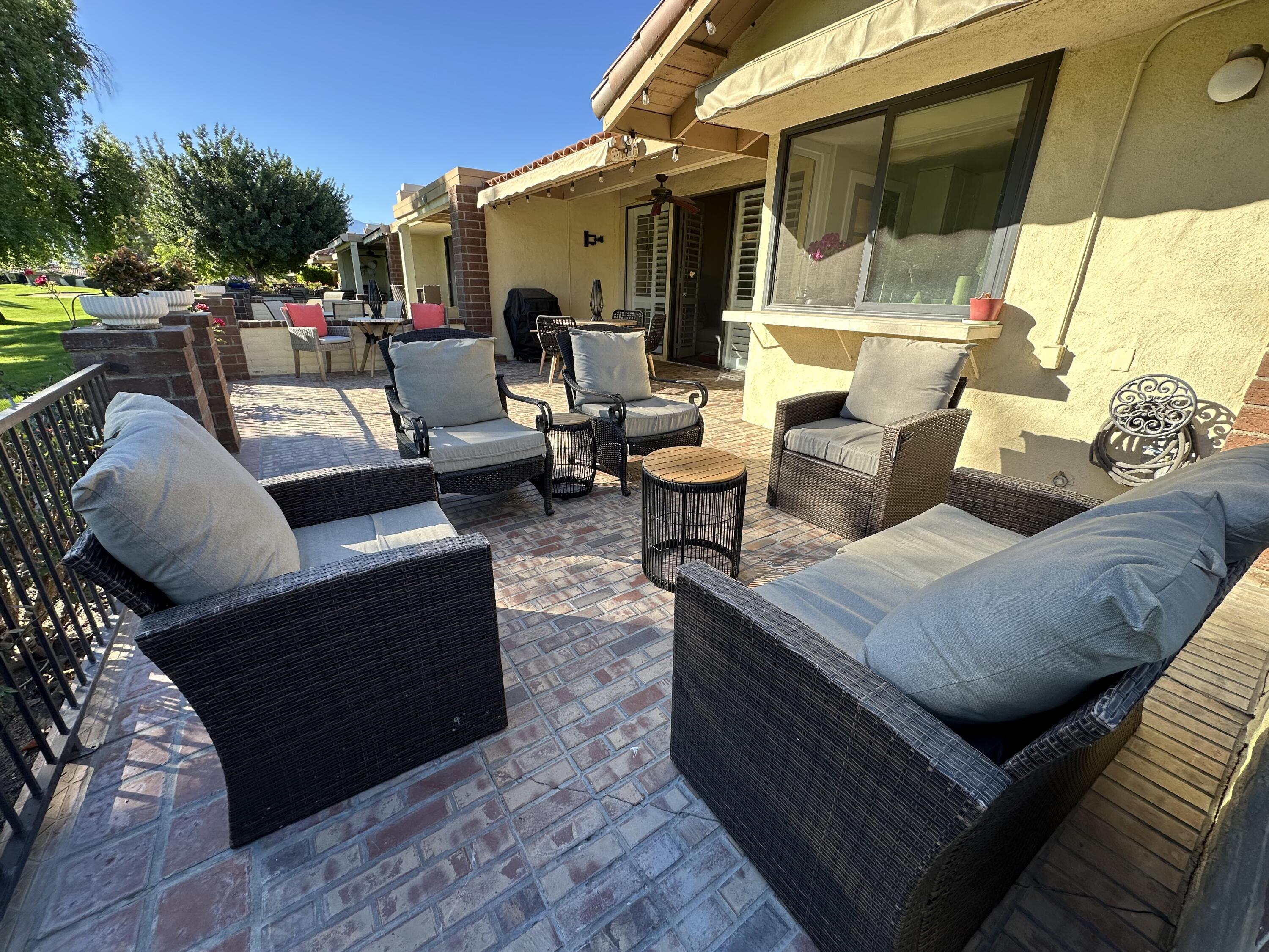 246 Santa Barbara Circle Palm Desert, CA 92260 - Photo 2 of 16 a building outdoor space with patio furniture