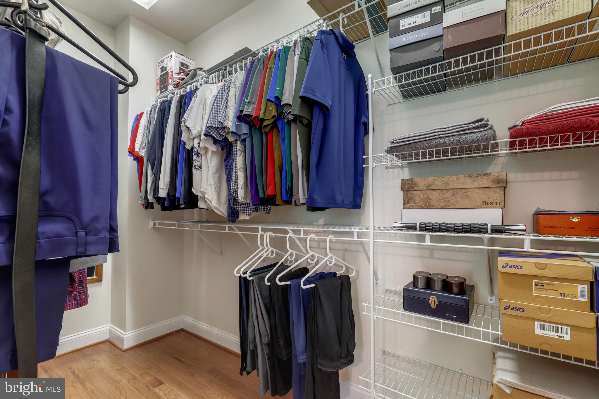 44268 Panther Ridge Drive Ashburn, VA 20147 - Photo 26 of 32 a view of a walk in closet