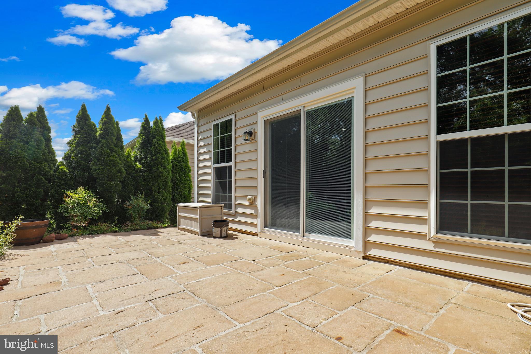 44268 Panther Ridge Drive Ashburn, VA 20147 - Photo 29 of 32 a view of a house with a yard