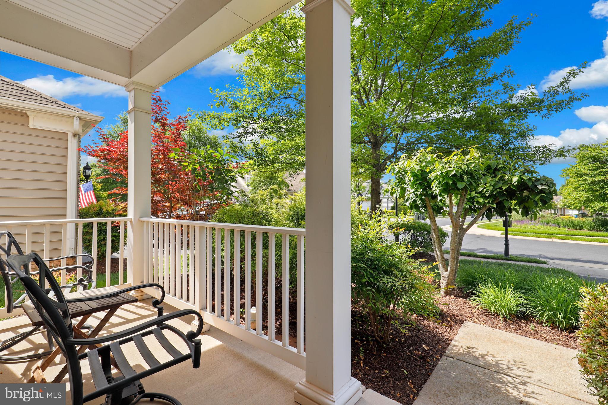 44268 Panther Ridge Drive Ashburn, VA 20147 - Photo 32 of 32 a view of a bench in the backyard
