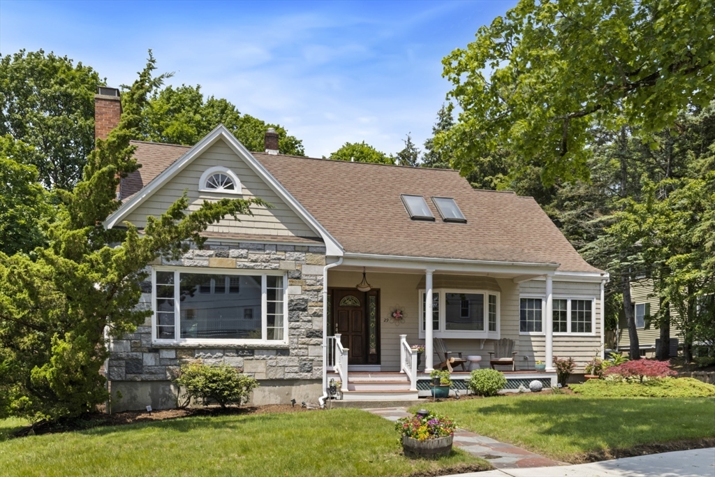 front view of a house with a yard