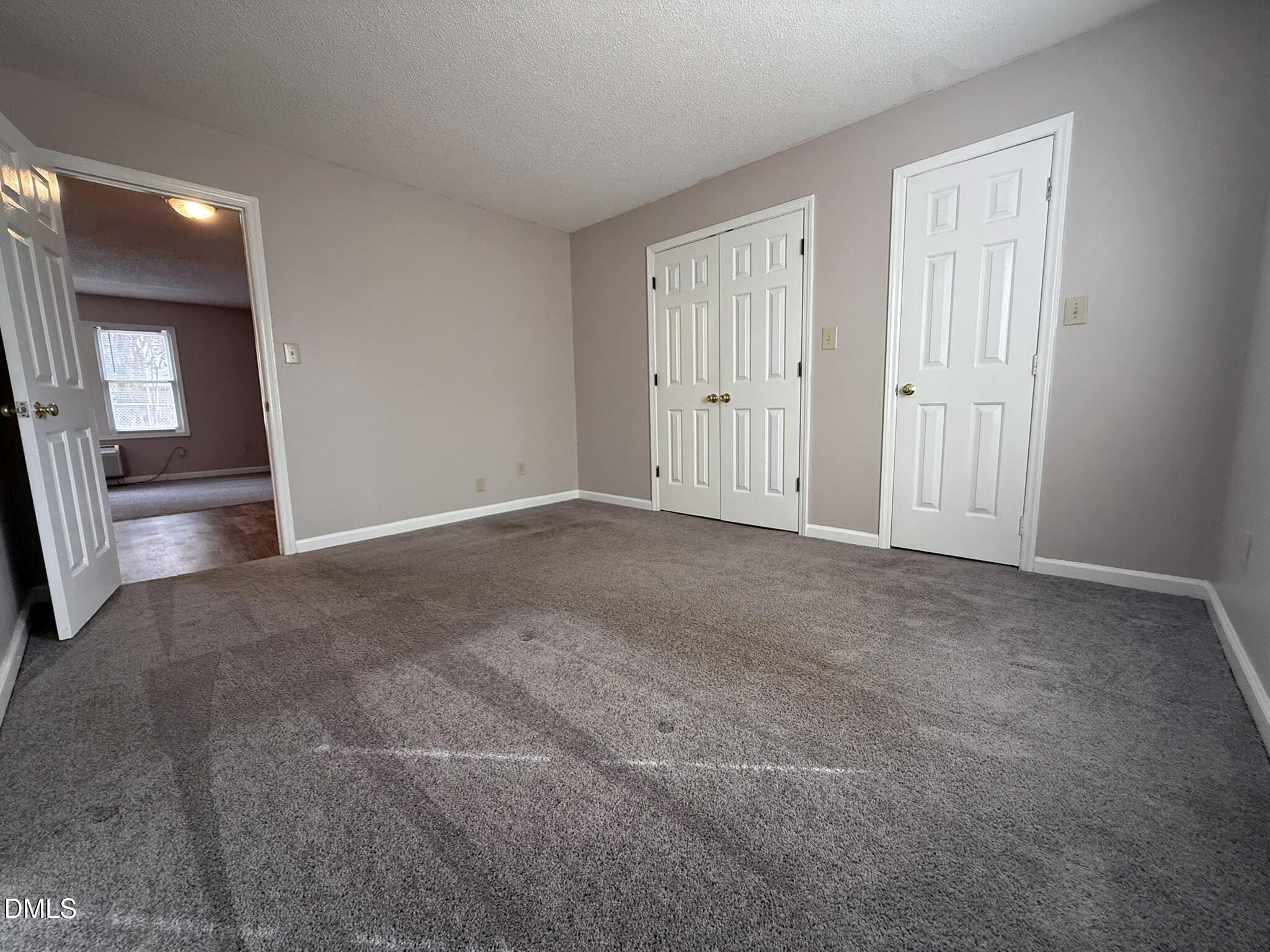 2120 Hawkins Street, Unit A Raleigh, NC 27610 - Photo 12 of 17 a view of an empty room with a fireplace
