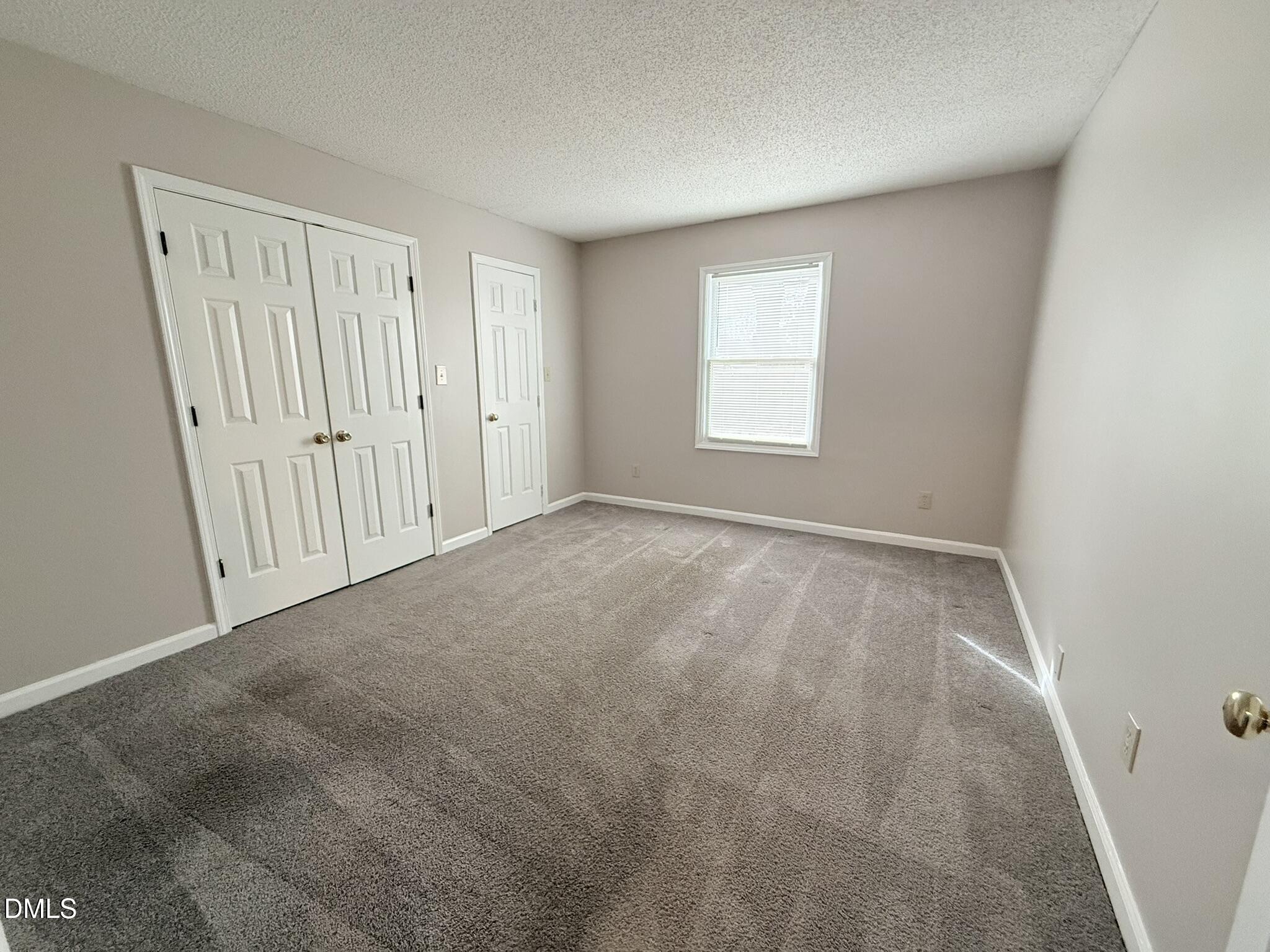 2120 Hawkins Street, Unit A Raleigh, NC 27610 - Photo 13 of 17 a view of an empty room with a window
