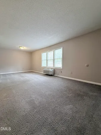a view of a room with a window
