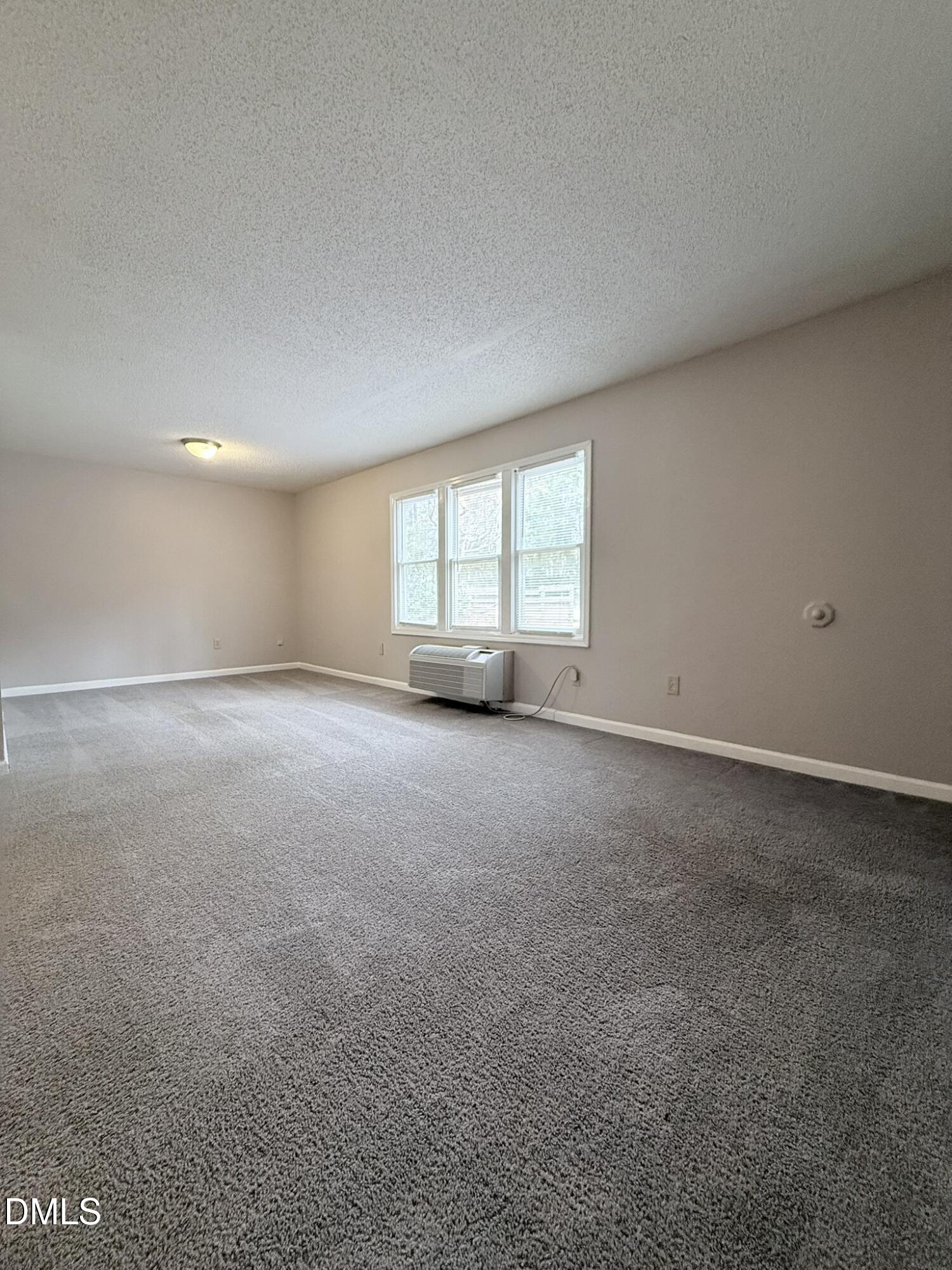 2120 Hawkins Street, Unit A Raleigh, NC 27610 - Photo 3 of 17 a view of a room with a window