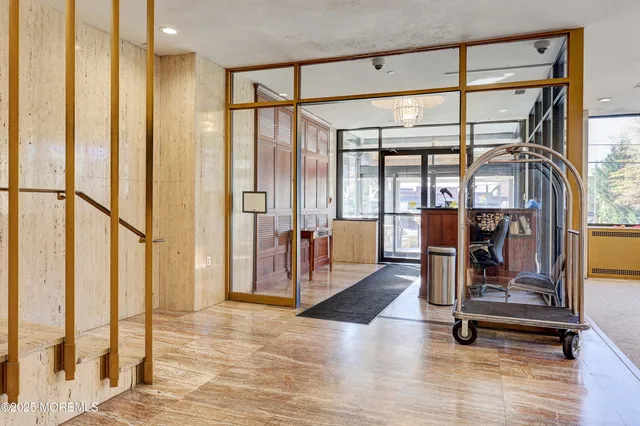 a view of a livingroom with furniture and window
