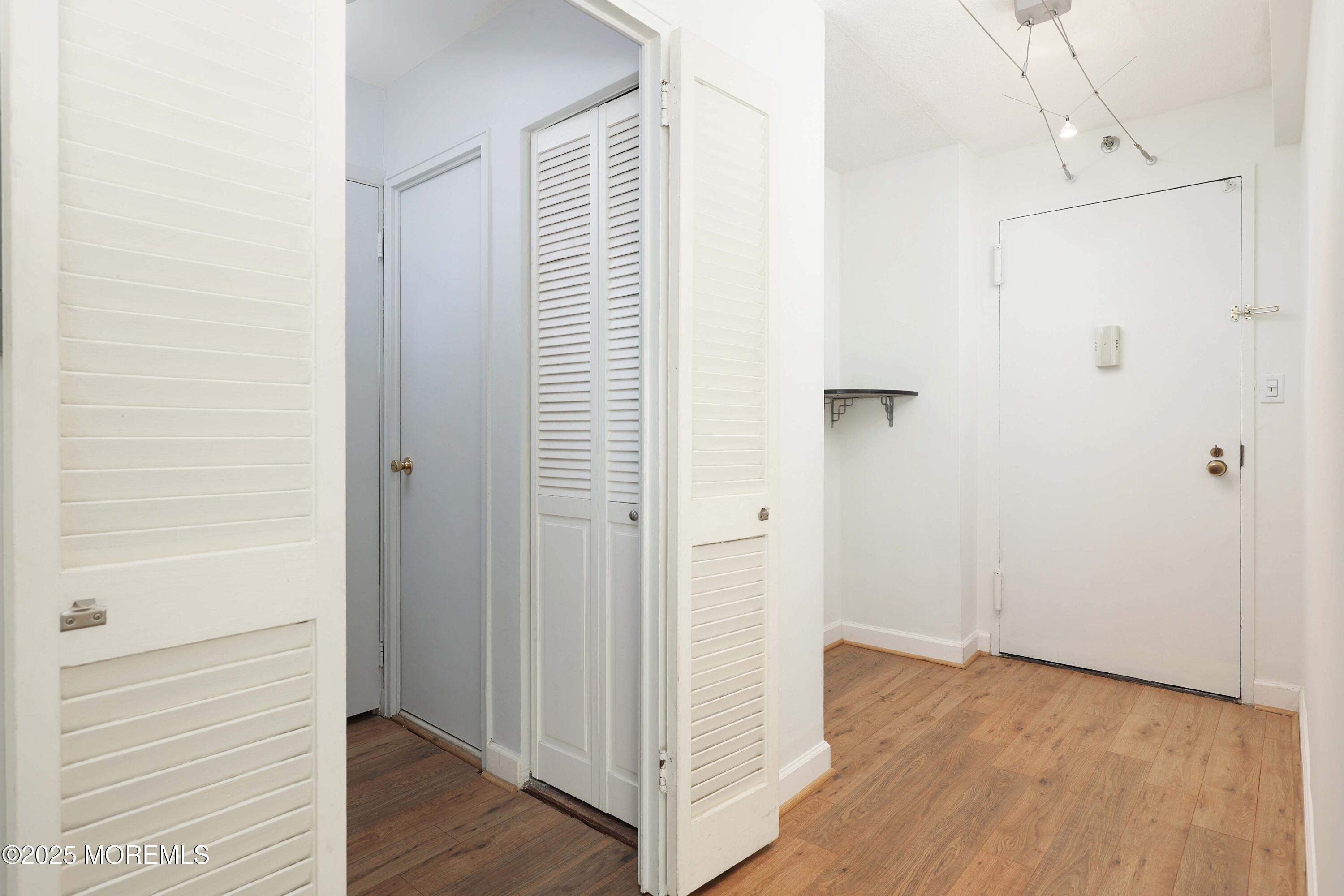 28 Riverside Avenue, Unit 7D Red Bank, NJ 07701 - Photo 6 of 28 a view of a room with wooden floor