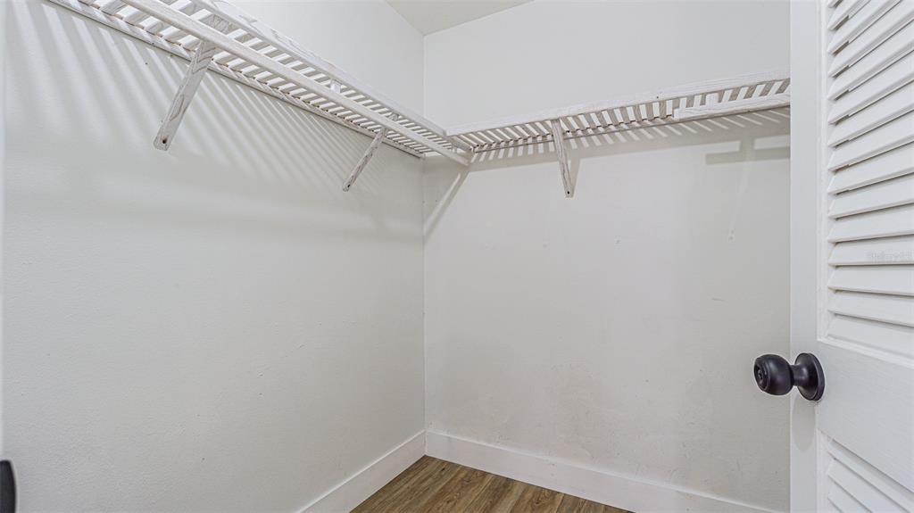 8405 Reynolds Drive Hudson, FL 34667 - Photo 15 of 30 a view of a room with racks on the wall