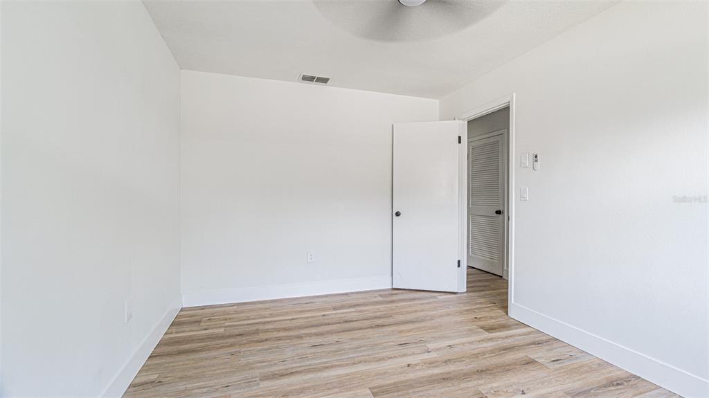 8405 Reynolds Drive Hudson, FL 34667 - Photo 19 of 30 a view of an empty room