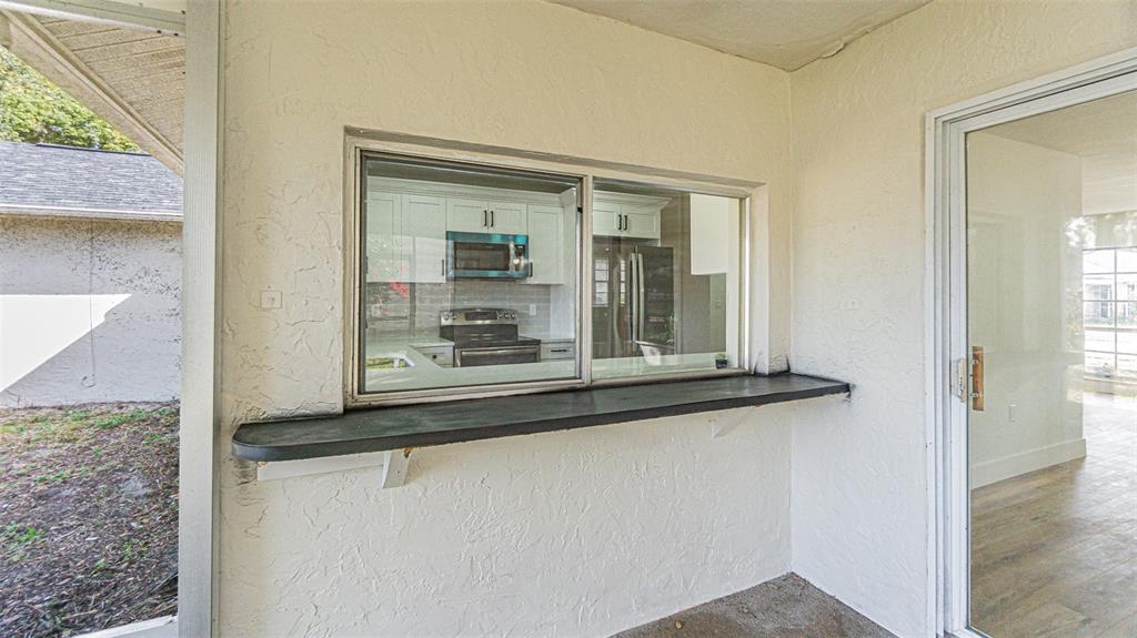 8405 Reynolds Drive Hudson, FL 34667 - Photo 26 of 30 a view of a door and a window