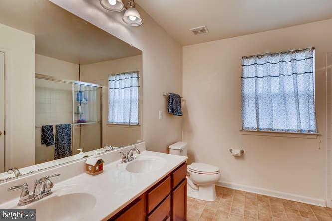 901 McCune Road Baltimore, MD 21220 - Photo 15 of 28 Master bath with shower and double sink