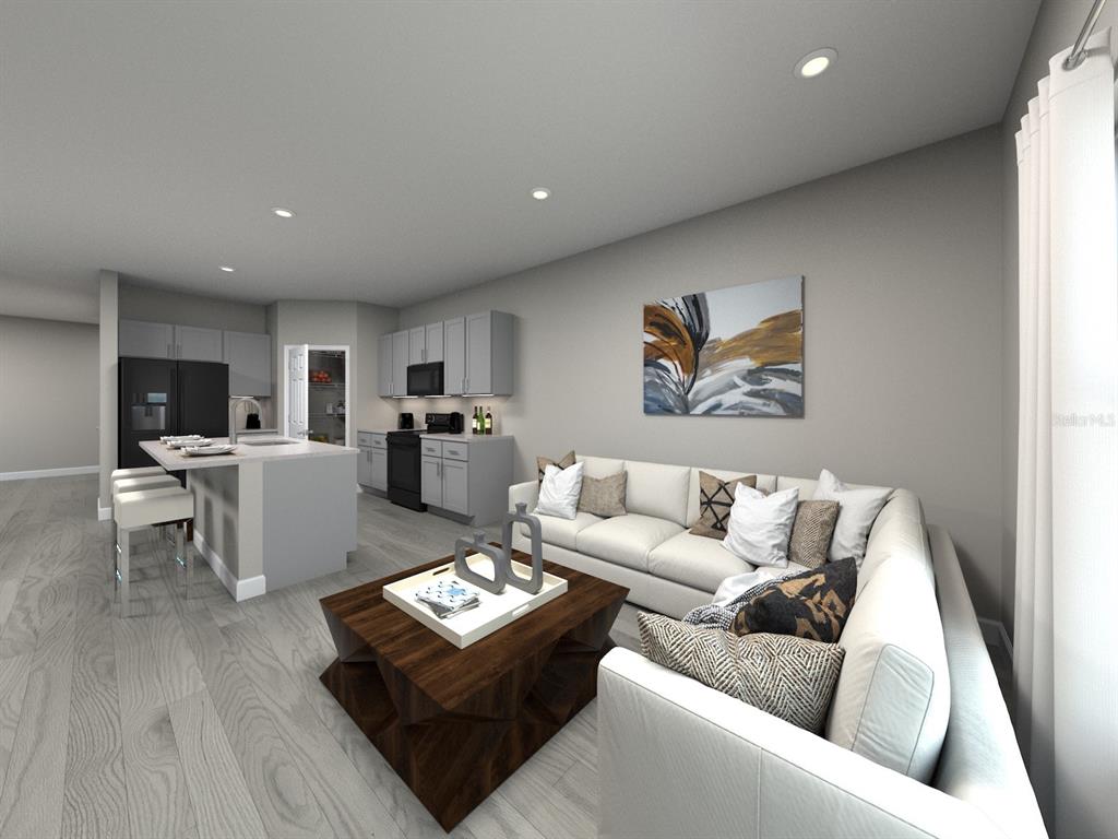 4668 Homestead Trail St. Cloud, FL 34772 - Photo 3 of 5 a living room with furniture and a flat screen tv