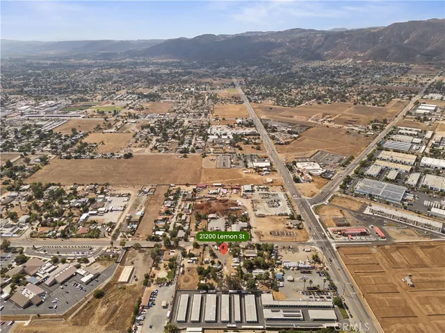 an aerial view of residential building with parking space