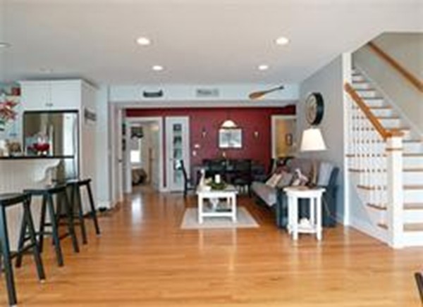 24 Sichols Colony Road Wales, MA 01081 - Photo 7 of 30 a living room with fireplace furniture and a wooden floor