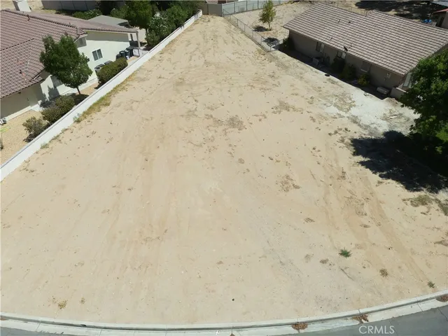 a view of balcony with wooden floor