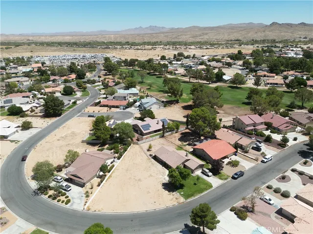 a view of balcony with wooden floor