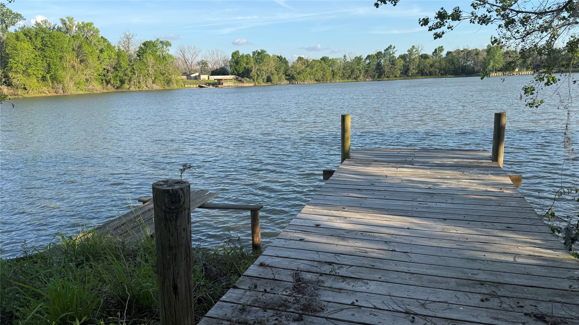 215 Weldon Livingston, TX 77351 - Photo 5 of 22 a view of a lake and outdoor space