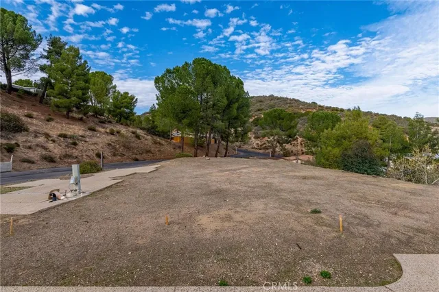 a view of a road with a yard