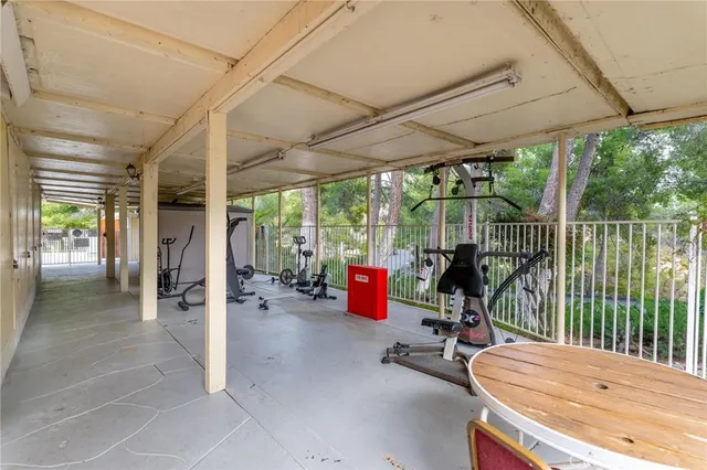 a view of balcony with patio