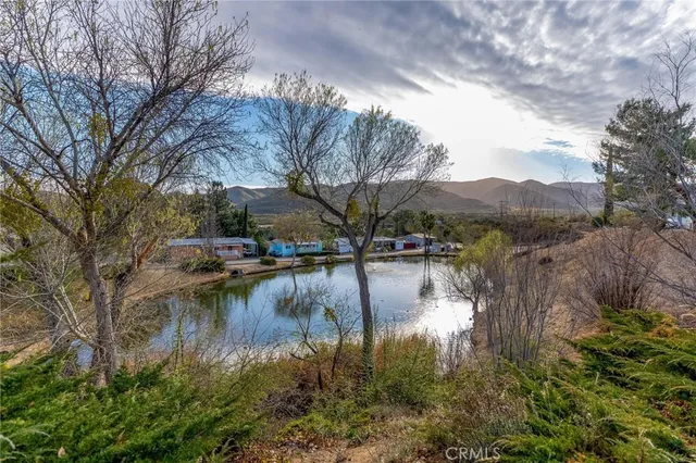 a view of lake view with mountain