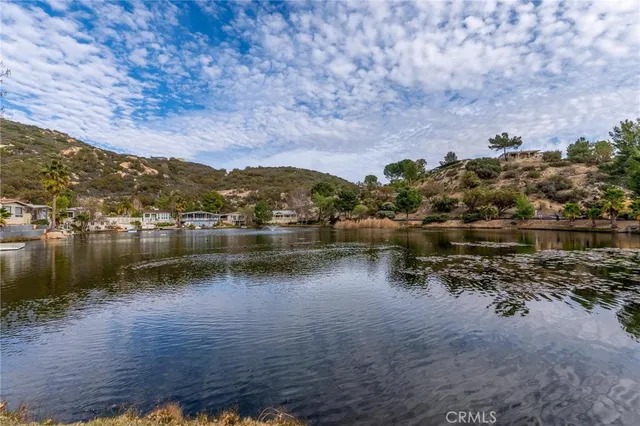 a view of lake with mountain