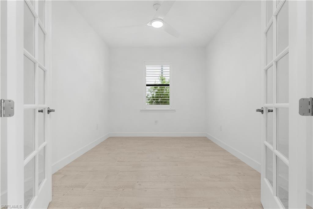 2104 Freemont Way Naples, FL 34119 - Photo 7 of 27 Den or personal office with french doors