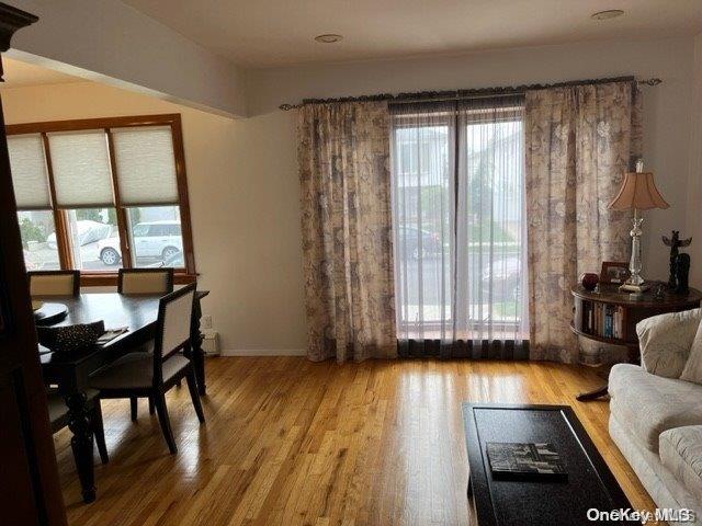 159-15 80th Street Queens, NY 11414 - Photo 7 of 13 a living room with furniture and a window