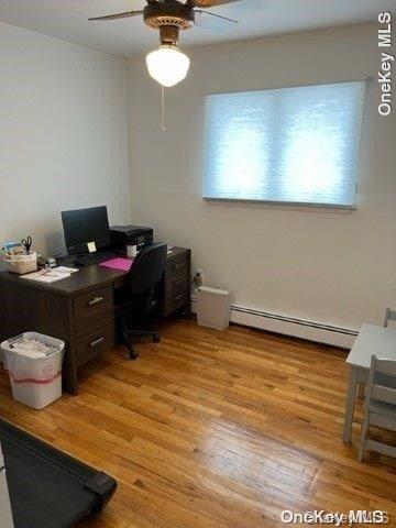 159-15 80th Street Queens, NY 11414 - Photo 8 of 13 a room with a desk and chair