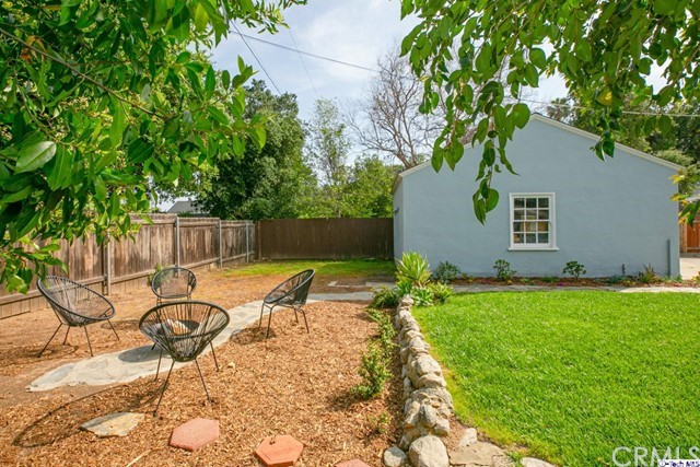 1446 North Harding Avenue Pasadena, CA 91104 - Photo 22 of 26 a backyard of a house with table and chairs