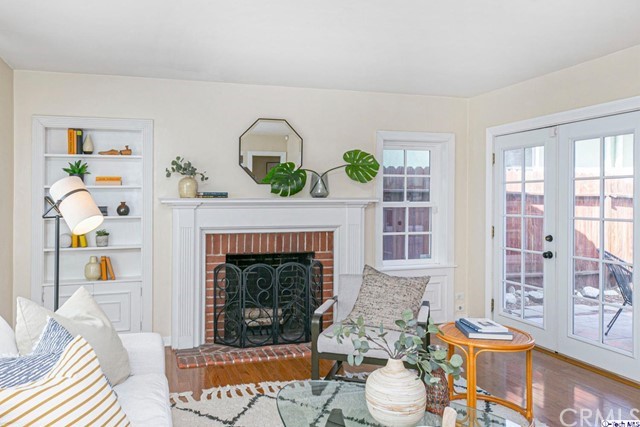 1446 North Harding Avenue Pasadena, CA 91104 - Photo 3 of 26 a living room with furniture and a fireplace