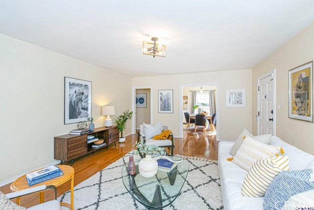 1446 North Harding Avenue Pasadena, CA 91104 - Photo 5 of 26 a living room with furniture and a chandelier