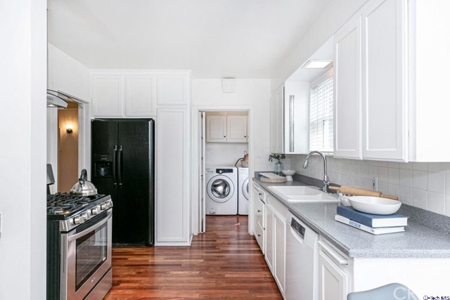 1446 North Harding Avenue Pasadena, CA 91104 - Photo 7 of 26 a kitchen with a sink stove and refrigerator