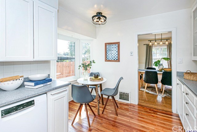1446 North Harding Avenue Pasadena, CA 91104 - Photo 8 of 26 a view of a dining room with furniture and wooden floor