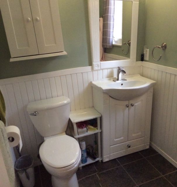 23 Cherry Hill, Unit 124 Hampton, IL 61256 - Photo 23 of 25 a bathroom with a sink and a toilet