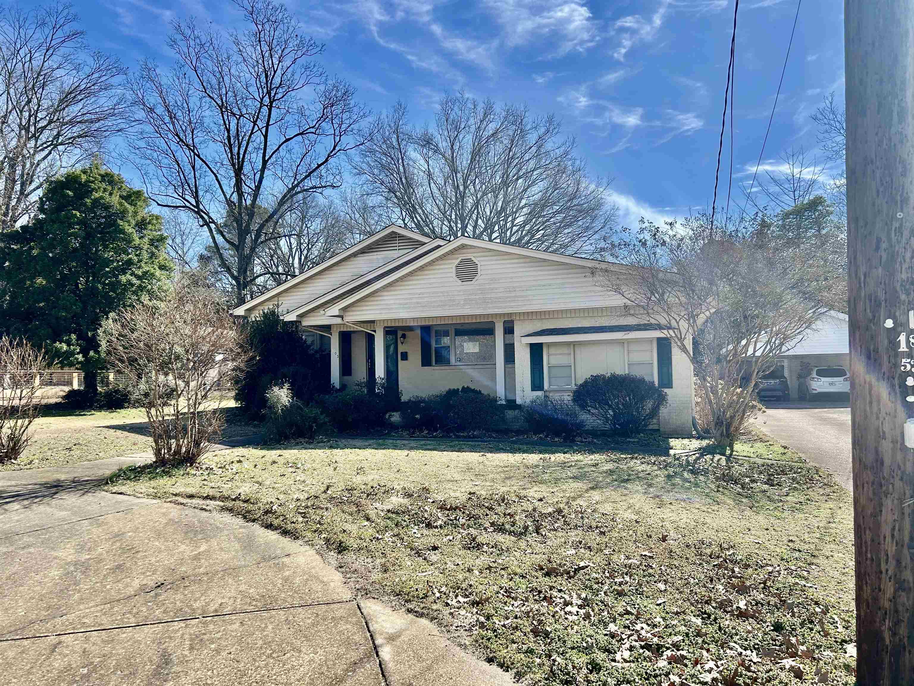 503 Terrace Drive Covington, TN 38019 - Photo 1 of 14 View of front of house featuring a porch and a front yard