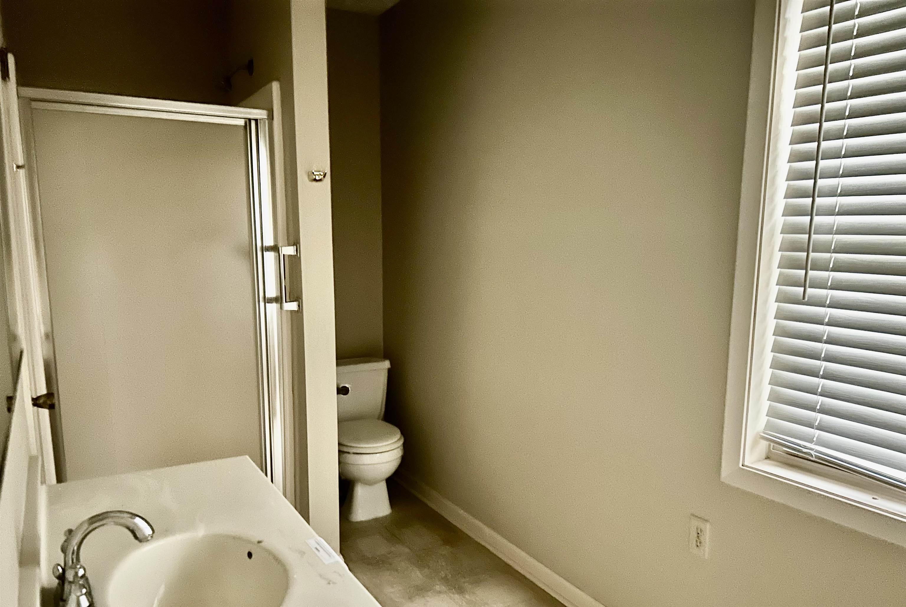 503 Terrace Drive Covington, TN 38019 - Photo 9 of 14 Bathroom with a shower stall and vanity