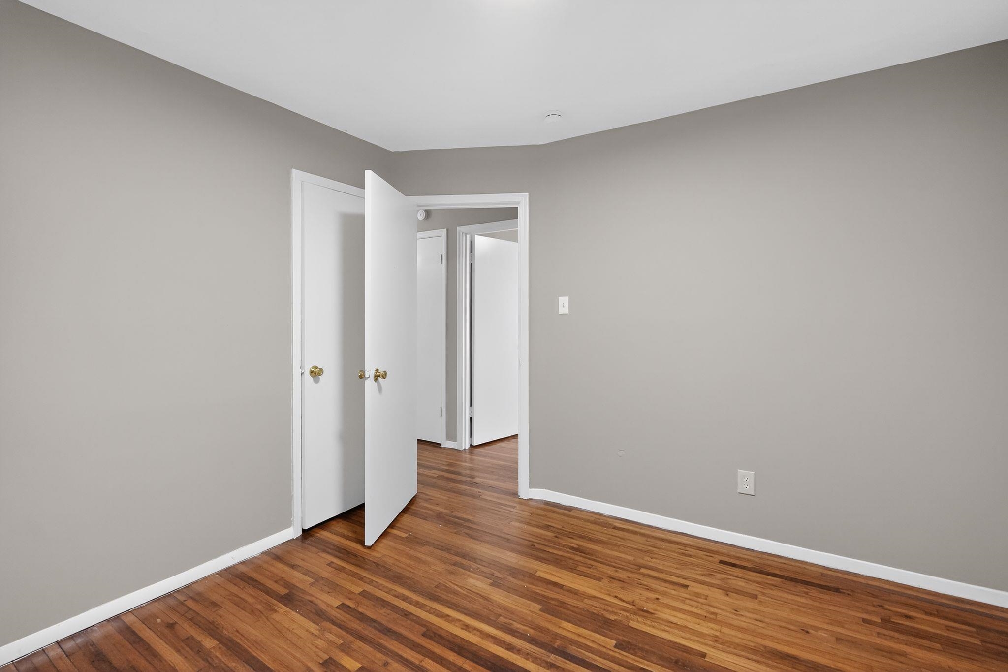 4955 Stacey Road Memphis, TN 38109 - Photo 19 of 35 Hardwood flooring featuring warm wood tones