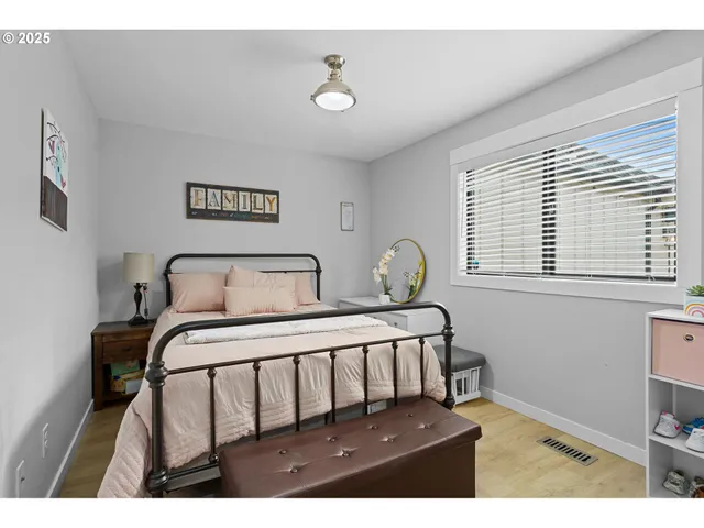 a bed room with a bed and a couch