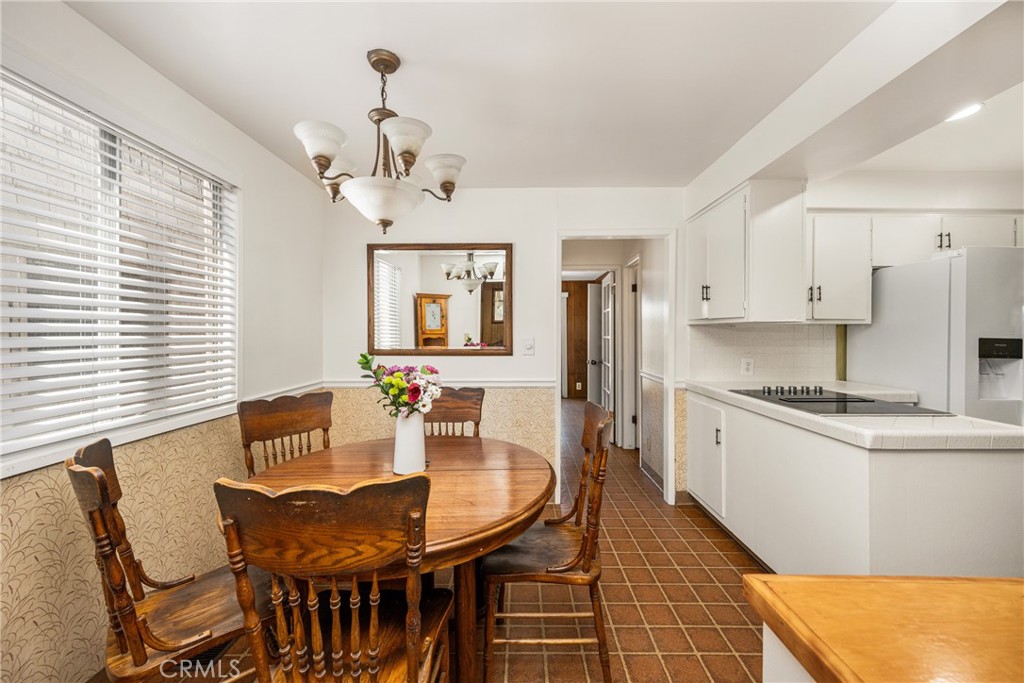 58 Surfside Avenue Surfside, CA 90743 - Photo 11 of 36 a view of a dining room with furniture and window