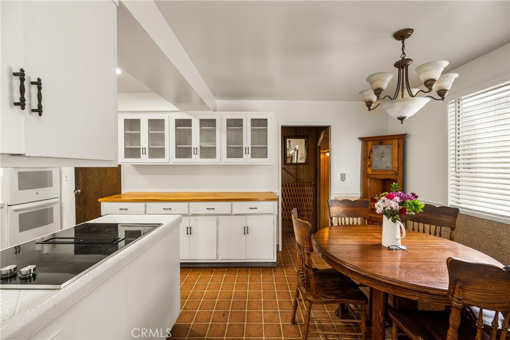 58 Surfside Avenue Surfside, CA 90743 - Photo 14 of 36 a kitchen with stainless steel appliances granite countertop a sink and cabinets