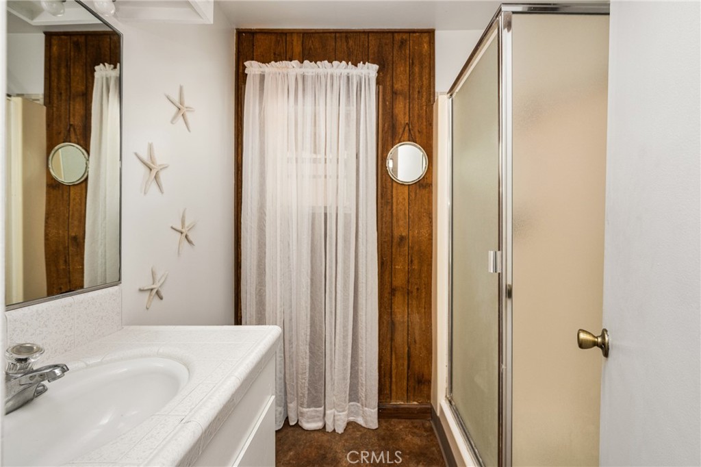 58 Surfside Avenue Surfside, CA 90743 - Photo 19 of 36 a bathroom with a tub and a sink