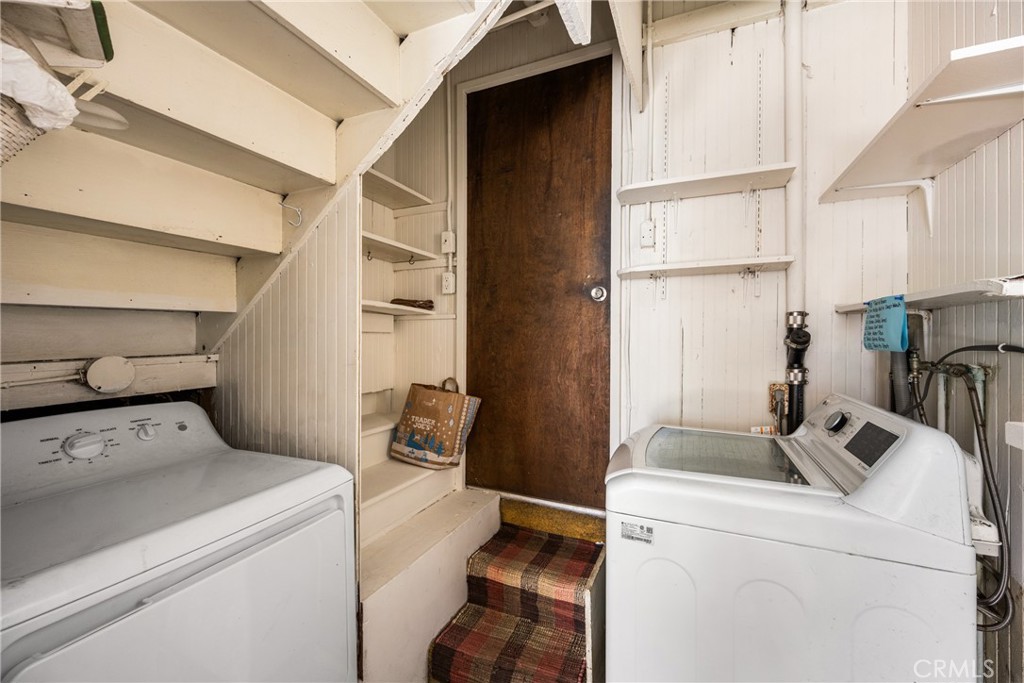 58 Surfside Avenue Surfside, CA 90743 - Photo 26 of 36 a utility room with dryer and washer