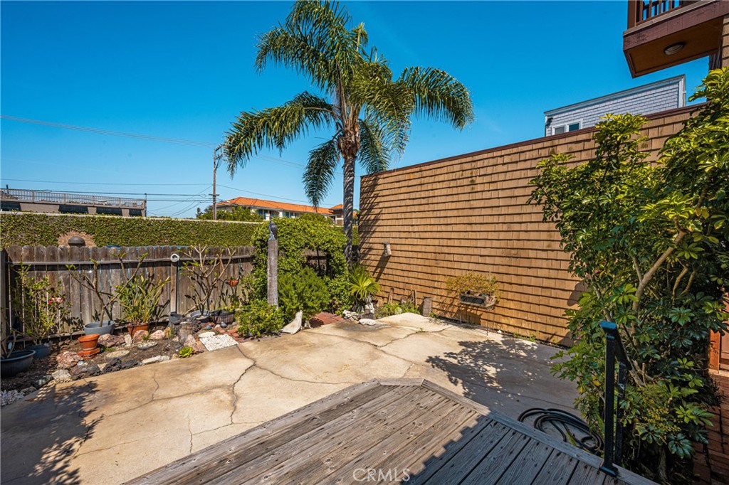 58 Surfside Avenue Surfside, CA 90743 - Photo 27 of 36 a view of a house with a patio