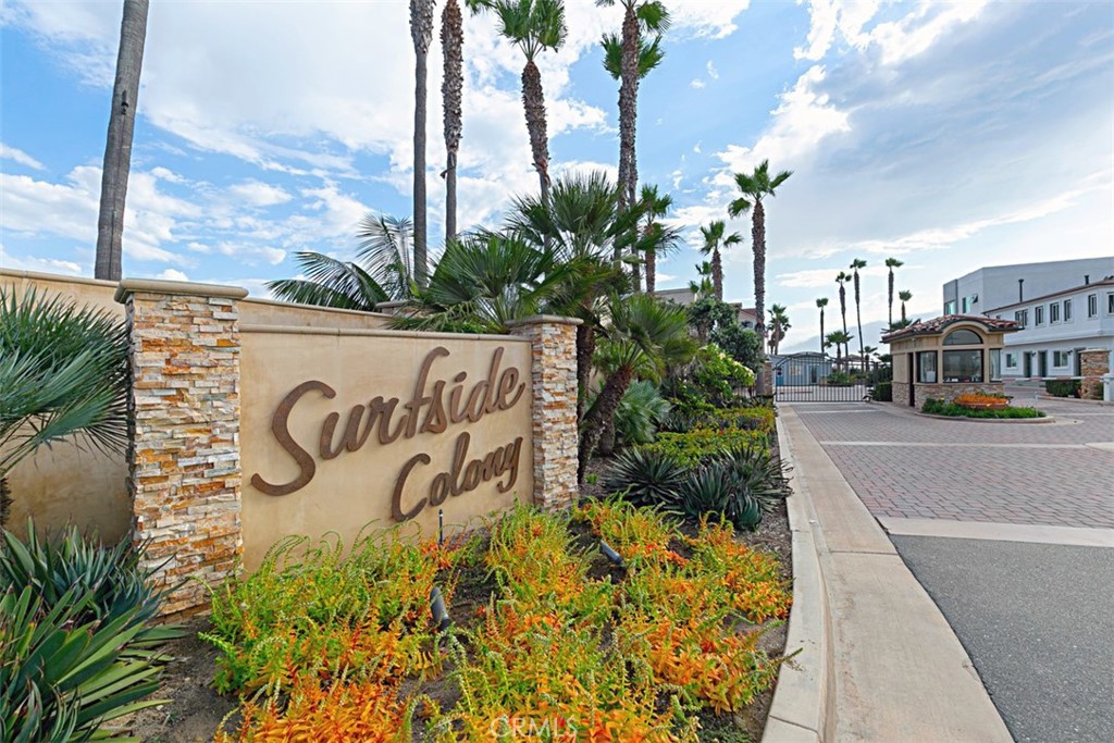 58 Surfside Avenue Surfside, CA 90743 - Photo 32 of 36 a sign on the side of a building