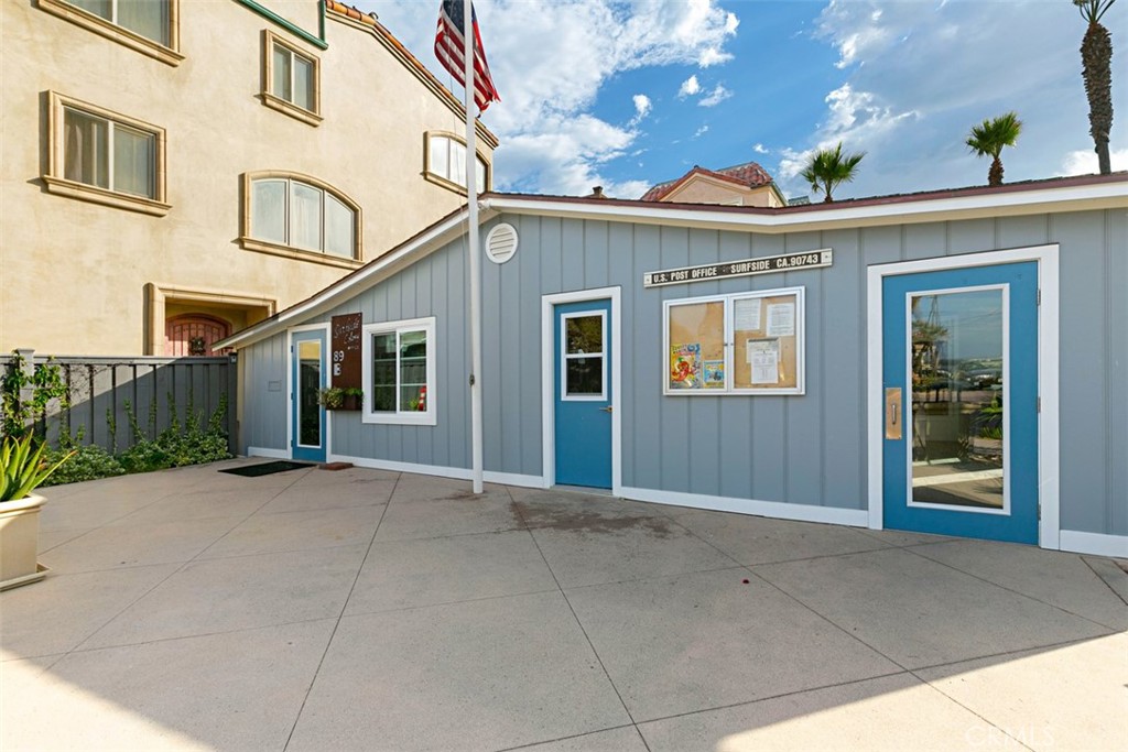 58 Surfside Avenue Surfside, CA 90743 - Photo 34 of 36 a view of a house with a garage