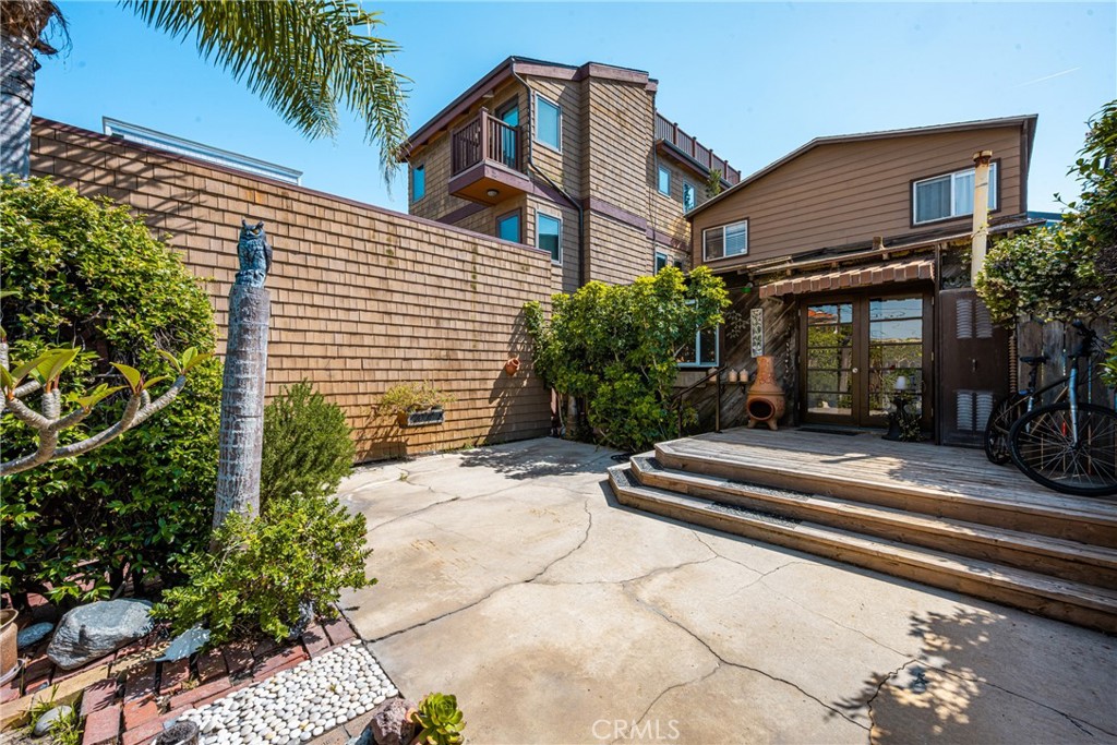 58 Surfside Avenue Surfside, CA 90743 - Photo 5 of 36 a house view with a outdoor space